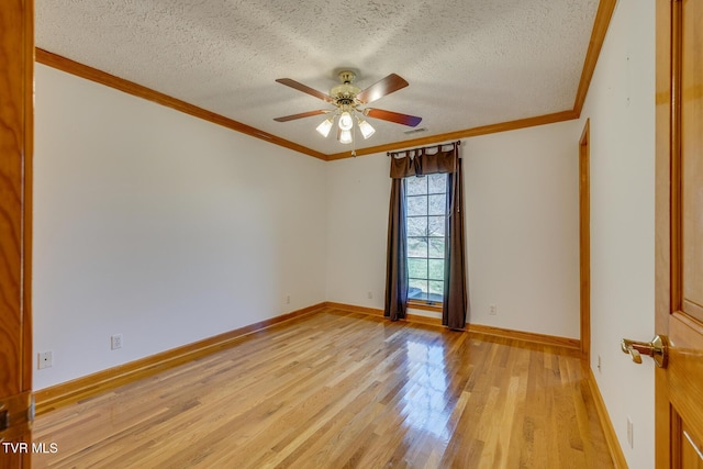 spare room with crown molding, a textured ceiling, ceiling fan, and light wood-style flooring