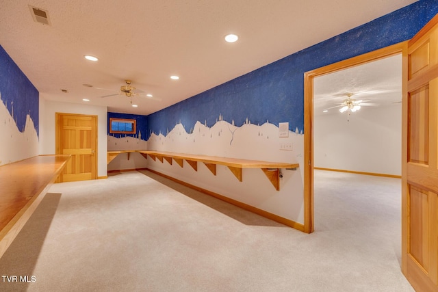 spare room featuring visible vents, ceiling fan, carpet flooring, and recessed lighting