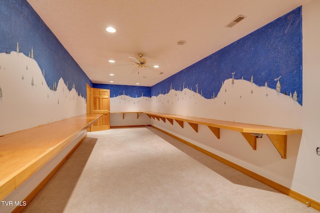 interior space with baseboards, recessed lighting, and carpet flooring