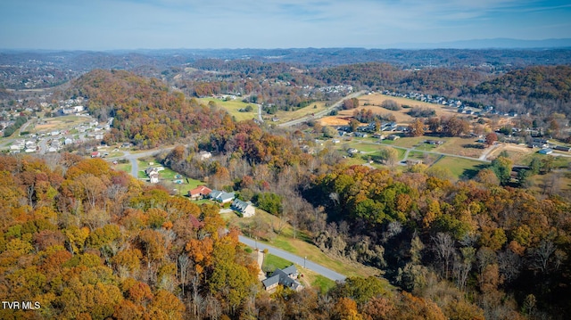 aerial view featuring a view of trees