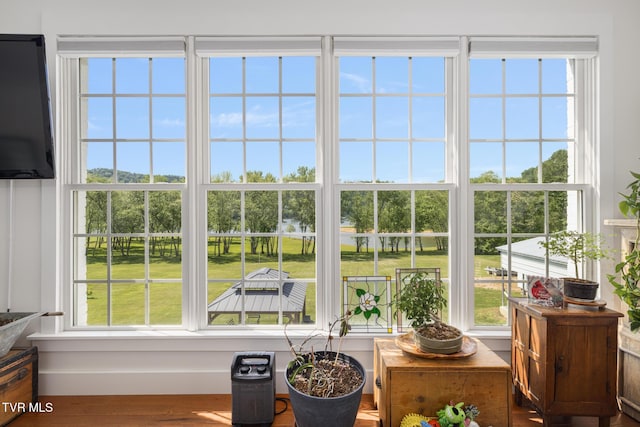 sunroom featuring a wealth of natural light