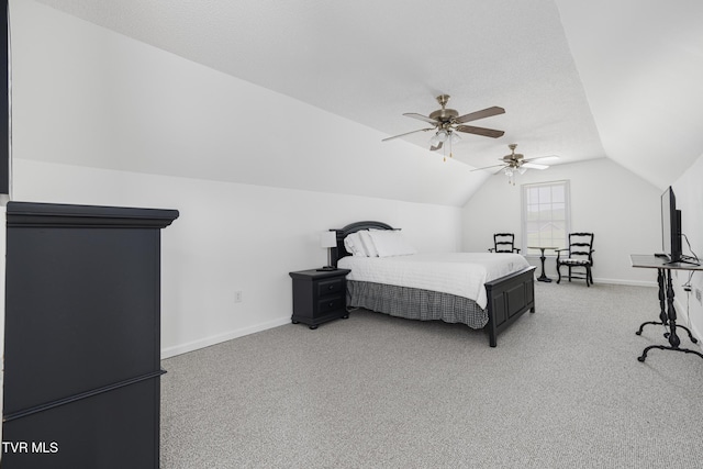 bedroom with baseboards, a ceiling fan, vaulted ceiling, and light carpet