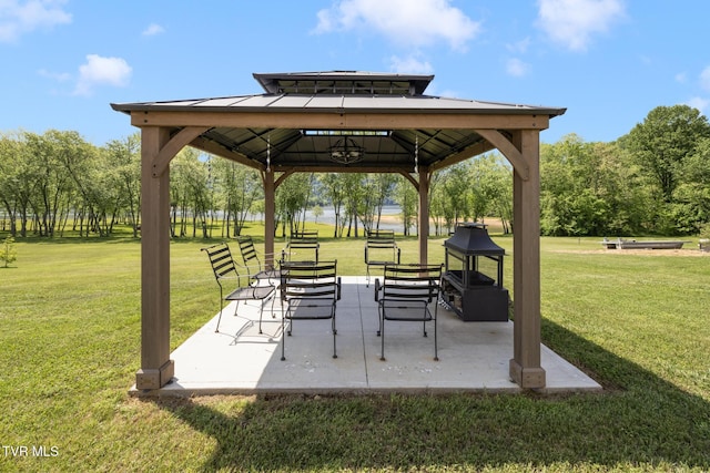view of community with a gazebo and a yard