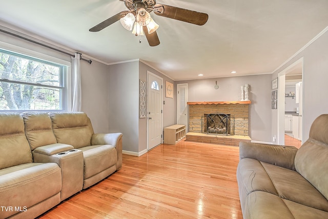 19032 Woodland Hills Rd, Abingdon, VA 24210 - living area with ceiling fan, baseboards, light wood-type flooring, ornamental molding, and a fireplace
