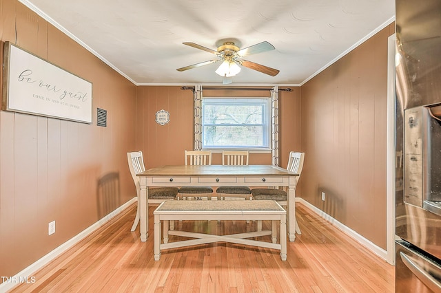 19032 Woodland Hills Rd, Abingdon, VA 24210 - dining room with ceiling fan, light wood-type flooring, and crown molding