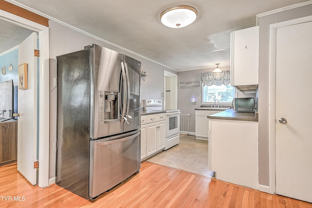 19032 Woodland Hills Rd, Abingdon, VA 24210 - kitchen with crown molding, white cabinets, electric stove, light wood-type flooring, and stainless steel fridge