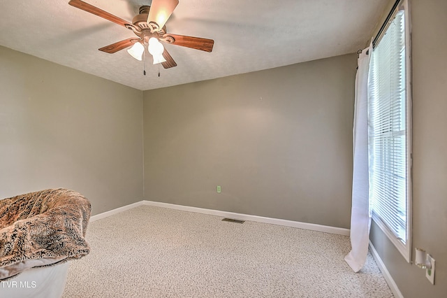 19032 Woodland Hills Rd, Abingdon, VA 24210 - unfurnished bedroom with visible vents, ceiling fan, carpet flooring, and baseboards