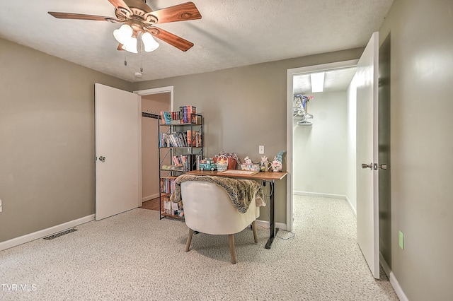 19032 Woodland Hills Rd, Abingdon, VA 24210 - carpeted office featuring baseboards, visible vents, a ceiling fan, and a textured ceiling