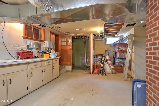 19032 Woodland Hills Rd, Abingdon, VA 24210 - basement featuring a sink