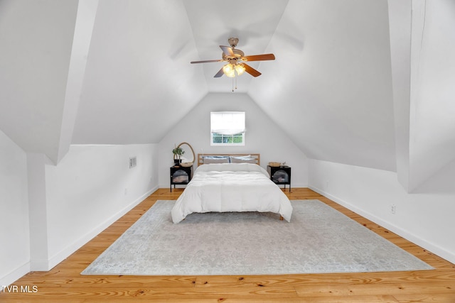 302 Wilson Ave, Johnson City, TN 37604 - bedroom with light wood-style floors, baseboards, and lofted ceiling