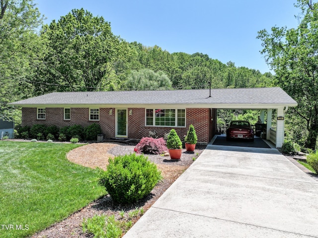 2004 Old Tusculum Rd, Greeneville, TN 37745 - single story home featuring an attached carport, driveway, a front lawn, and brick siding