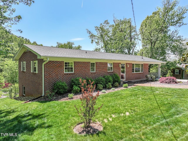 2004 Old Tusculum Rd, Greeneville, TN 37745 - view of front of property featuring brick siding, fence, and a front yard
