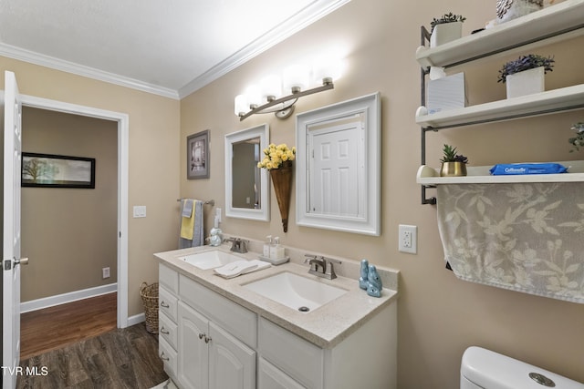 2004 Old Tusculum Rd, Greeneville, TN 37745 - bathroom with a sink, ornamental molding, toilet, and wood finished floors
