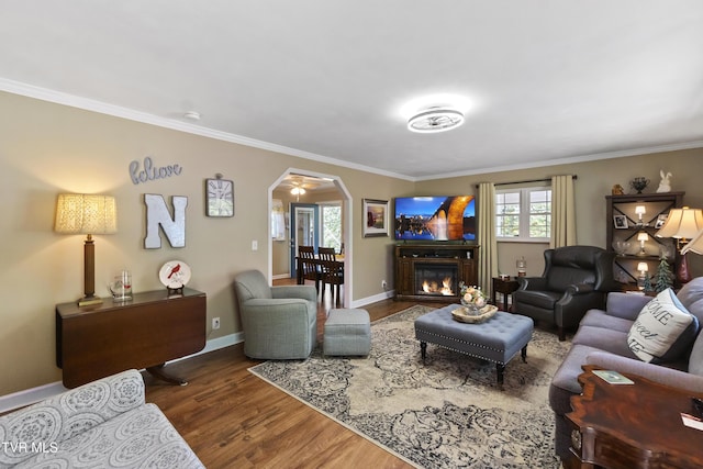 2004 Old Tusculum Rd, Greeneville, TN 37745 - living area with crown molding, baseboards, and wood finished floors