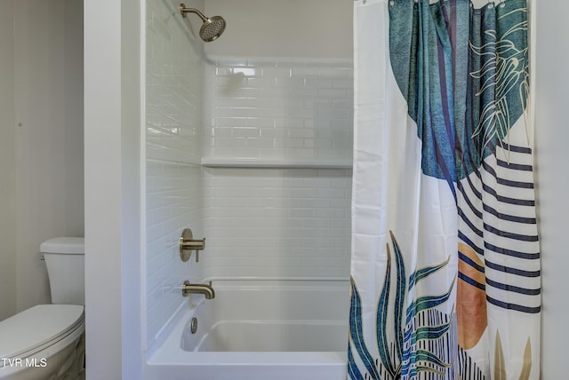 bathroom with toilet and shower / tub combo with curtain