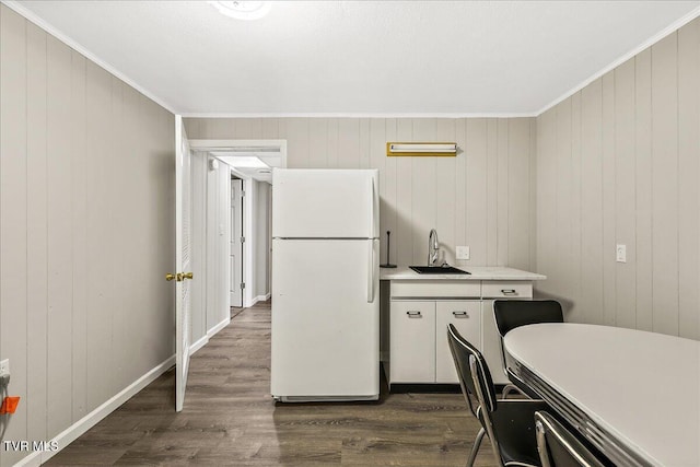 1837 Presswood Rd Unit 1837, Johnson City, TN 37604 - kitchen with dark wood-type flooring, freestanding refrigerator, a sink, and crown molding