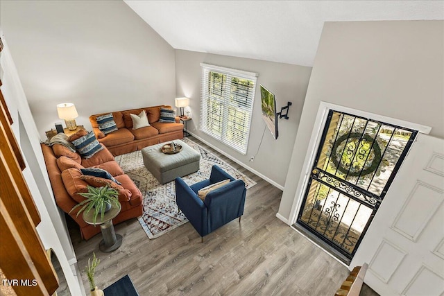 1837 Presswood Rd Unit 1837, Johnson City, TN 37604 - living room with light wood-style floors, high vaulted ceiling, and baseboards