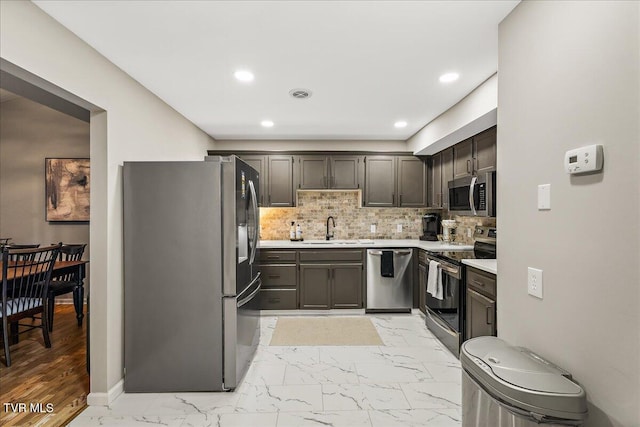1837 Presswood Rd Unit 1837, Johnson City, TN 37604 - kitchen with light countertops, stainless steel appliances, a sink, and marble finish floor