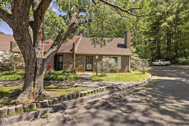 1837 Presswood Rd Unit 1837, Johnson City, TN 37604 - view of front of house featuring a chimney and brick siding