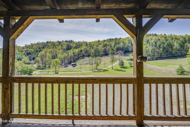 exterior space with a forest view