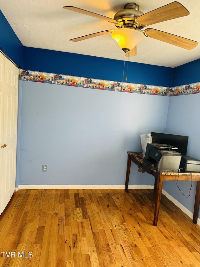 84 Deerview Ln, Lebanon, VA 24266 - bedroom with a ceiling fan, baseboards, and wood finished floors