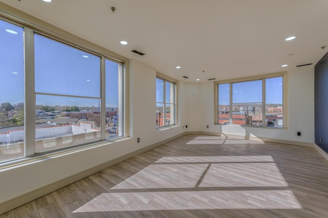 200 E Main St Unit 5, Johnson City, TN 37604 - empty room featuring recessed lighting, baseboards, visible vents, and wood finished floors