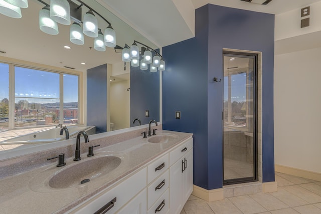 200 E Main St Unit 5, Johnson City, TN 37604 - full bathroom with a sink, baseboards, tile patterned flooring, and a stall shower