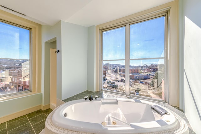 200 E Main St Unit 5, Johnson City, TN 37604 - bathroom with a tub with jets, a healthy amount of sunlight, and visible vents