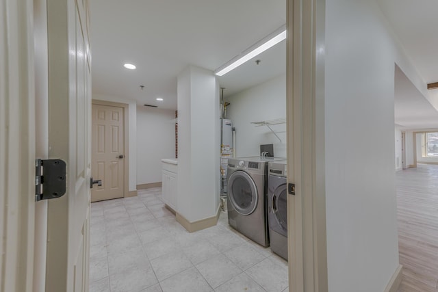 200 E Main St Unit 5, Johnson City, TN 37604 - laundry room with separate washer and dryer, baseboards, and recessed lighting