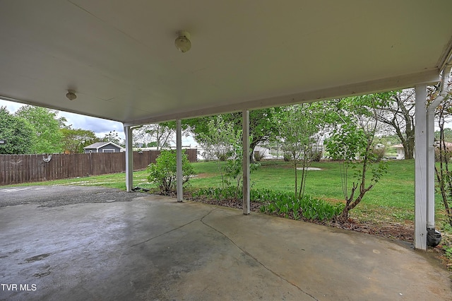 view of patio featuring fence