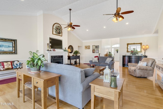 963 Beaver Creek Rd, Bluff City, TN 37618 - living area with light wood-style floors, ceiling fan, and a tile fireplace