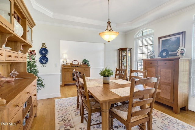 963 Beaver Creek Rd, Bluff City, TN 37618 - dining room with crown molding, light wood-style flooring, and a tray ceiling
