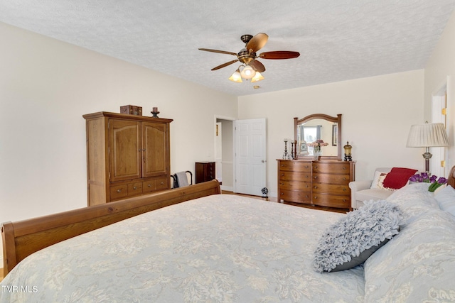 963 Beaver Creek Rd, Bluff City, TN 37618 - bedroom featuring a textured ceiling and ceiling fan