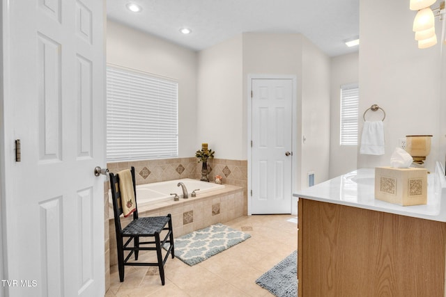 963 Beaver Creek Rd, Bluff City, TN 37618 - bathroom with recessed lighting, tile patterned floors, a bath, and vanity