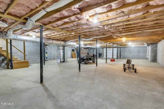 963 Beaver Creek Rd, Bluff City, TN 37618 - unfinished basement with stairway and electric water heater