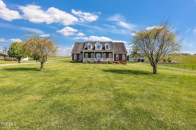 963 Beaver Creek Rd, Bluff City, TN 37618 - new england style home with a porch, fence, and a front yard