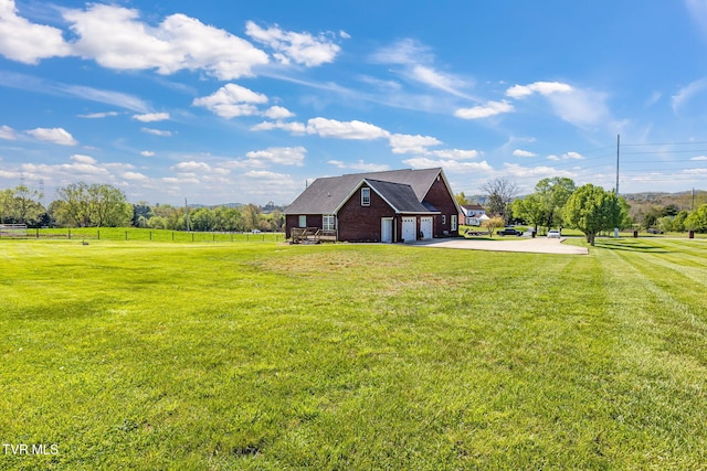 963 Beaver Creek Rd, Bluff City, TN 37618 - view of home's exterior with a garage, fence, brick siding, concrete driveway, and a yard