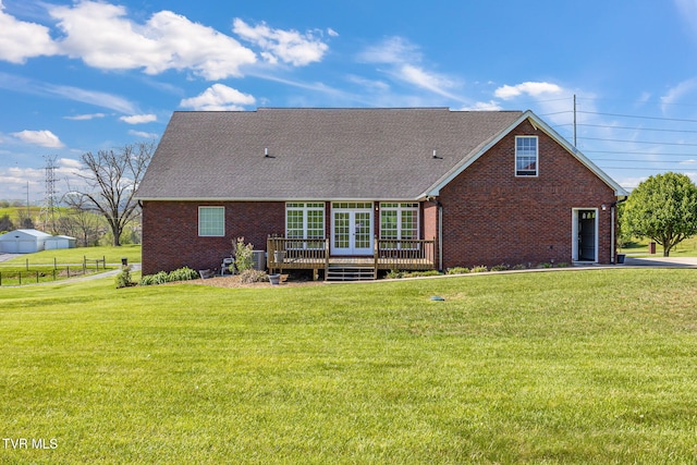 963 Beaver Creek Rd, Bluff City, TN 37618 - back of house featuring a lawn, brick siding, and a deck