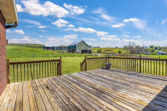 963 Beaver Creek Rd, Bluff City, TN 37618 - wooden terrace featuring fence, a barn, an outbuilding, a rural view, and a yard