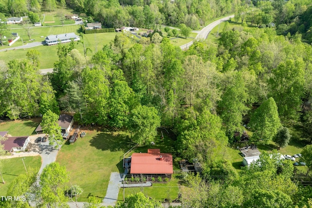 aerial view featuring a forest view