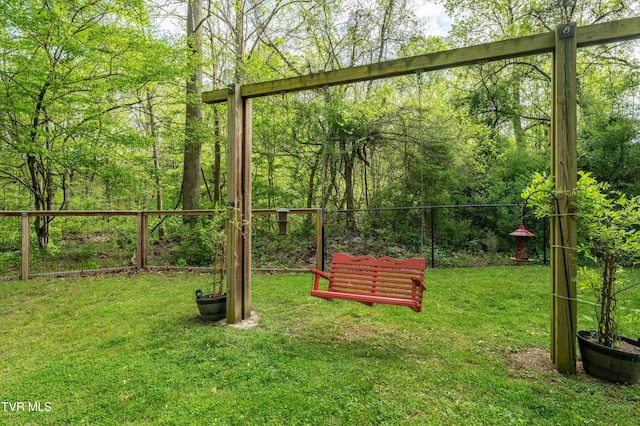 exterior space with a yard and fence