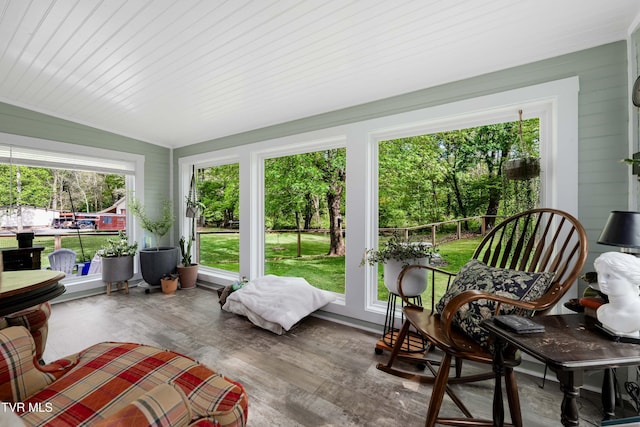 sunroom / solarium with wood finished floors