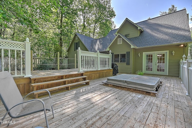 wooden terrace featuring french doors