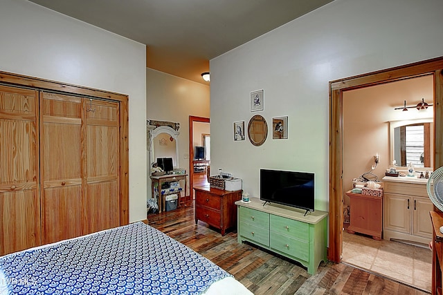 bedroom featuring wood finished floors