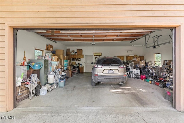 garage featuring a garage door opener