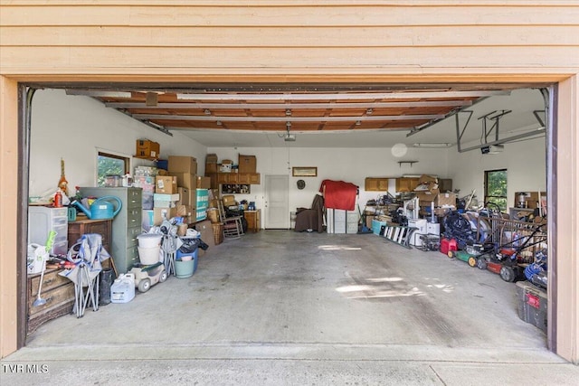 garage featuring a garage door opener
