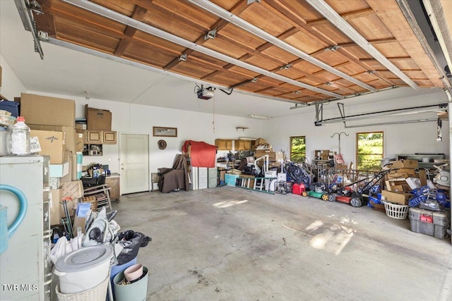 garage featuring a garage door opener