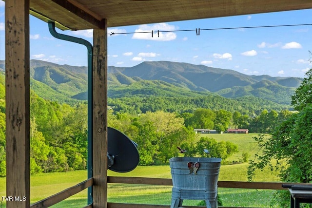 property view of mountains featuring a wooded view