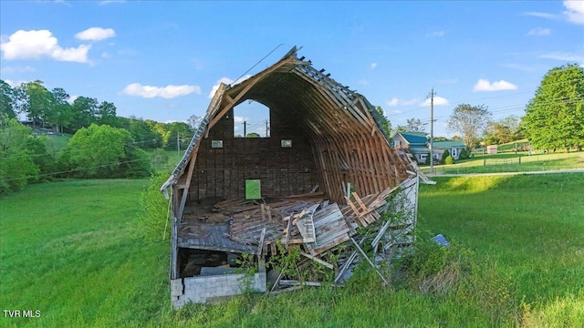 view of home's exterior with a yard
