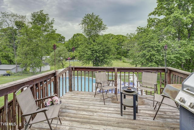 115 Maple Ridge Dr, Jonesborough, TN 37659 - wooden terrace with an outdoor pool and view of wooded area
